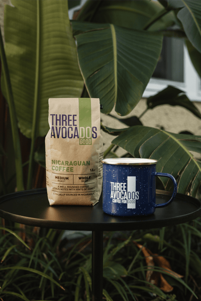 A photo of Nicaraguan medium roast coffee next to a mug