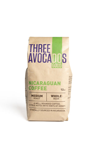 A brown bag of Nicaraguan Coffee, medium roast, whole bean from Three Avocados.